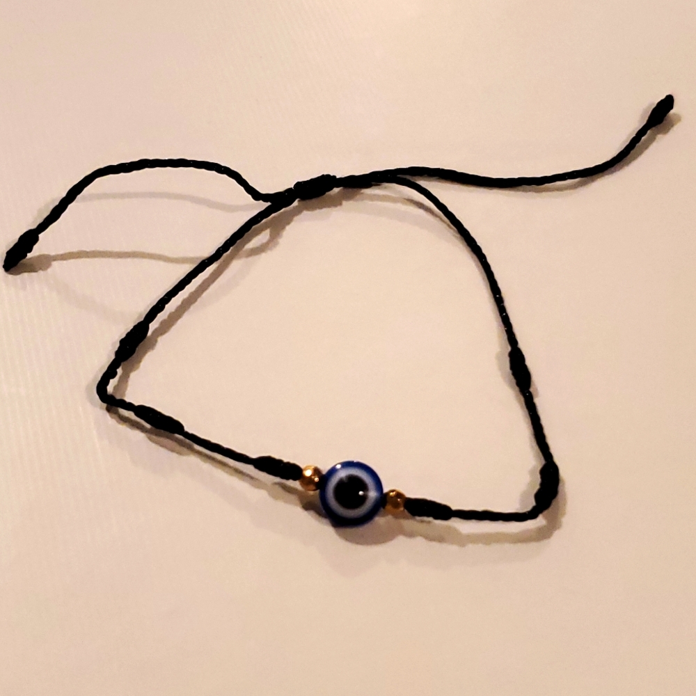 Evil eye bracelet with black string